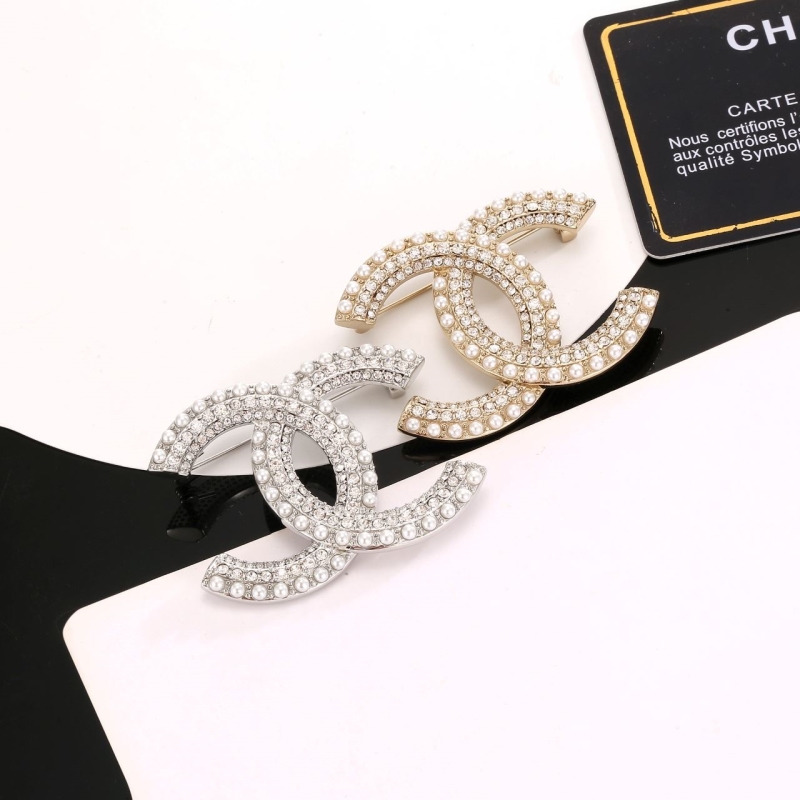 Ch**el brooches